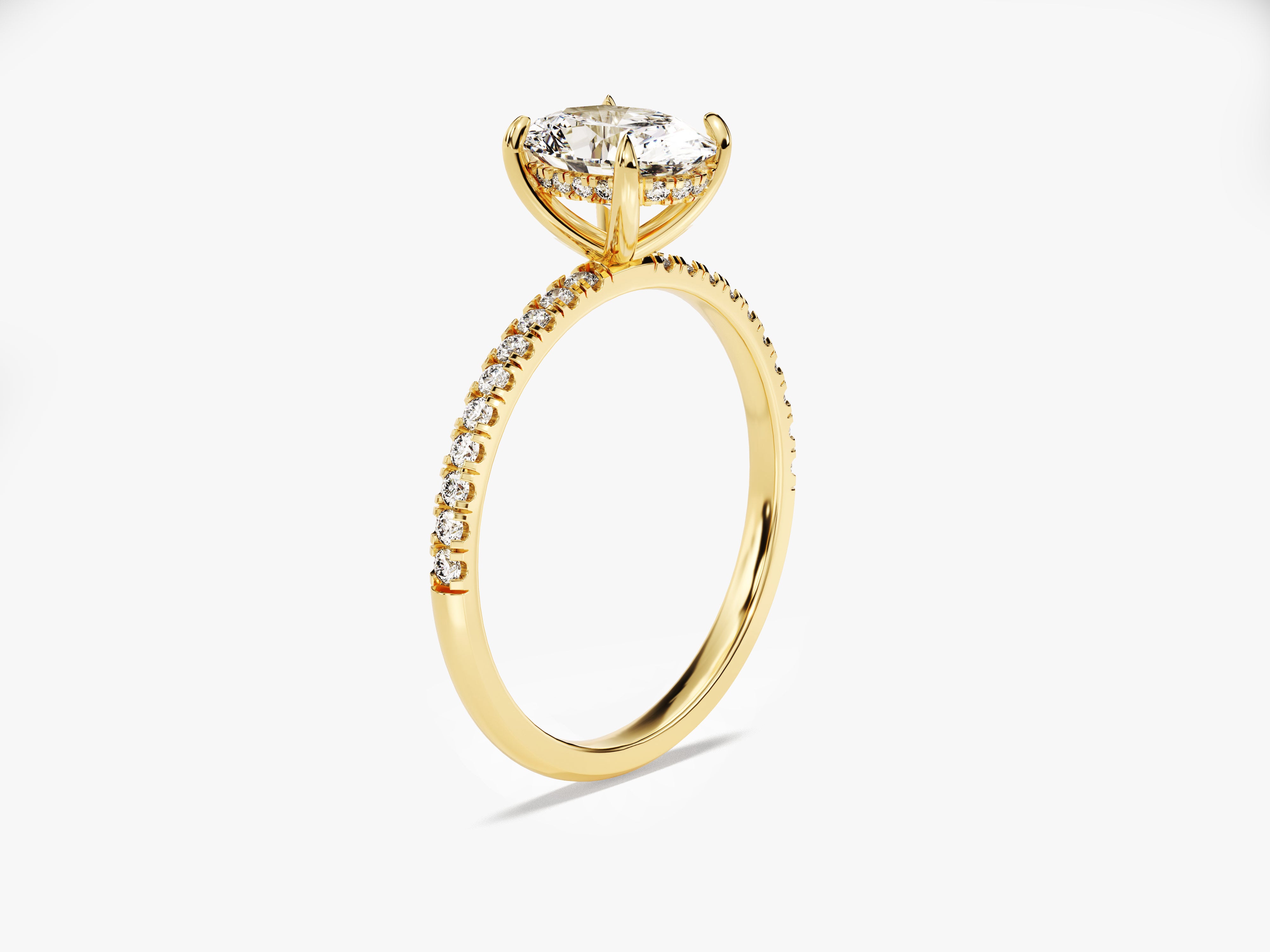 Gold diamond engagement ring with pave band