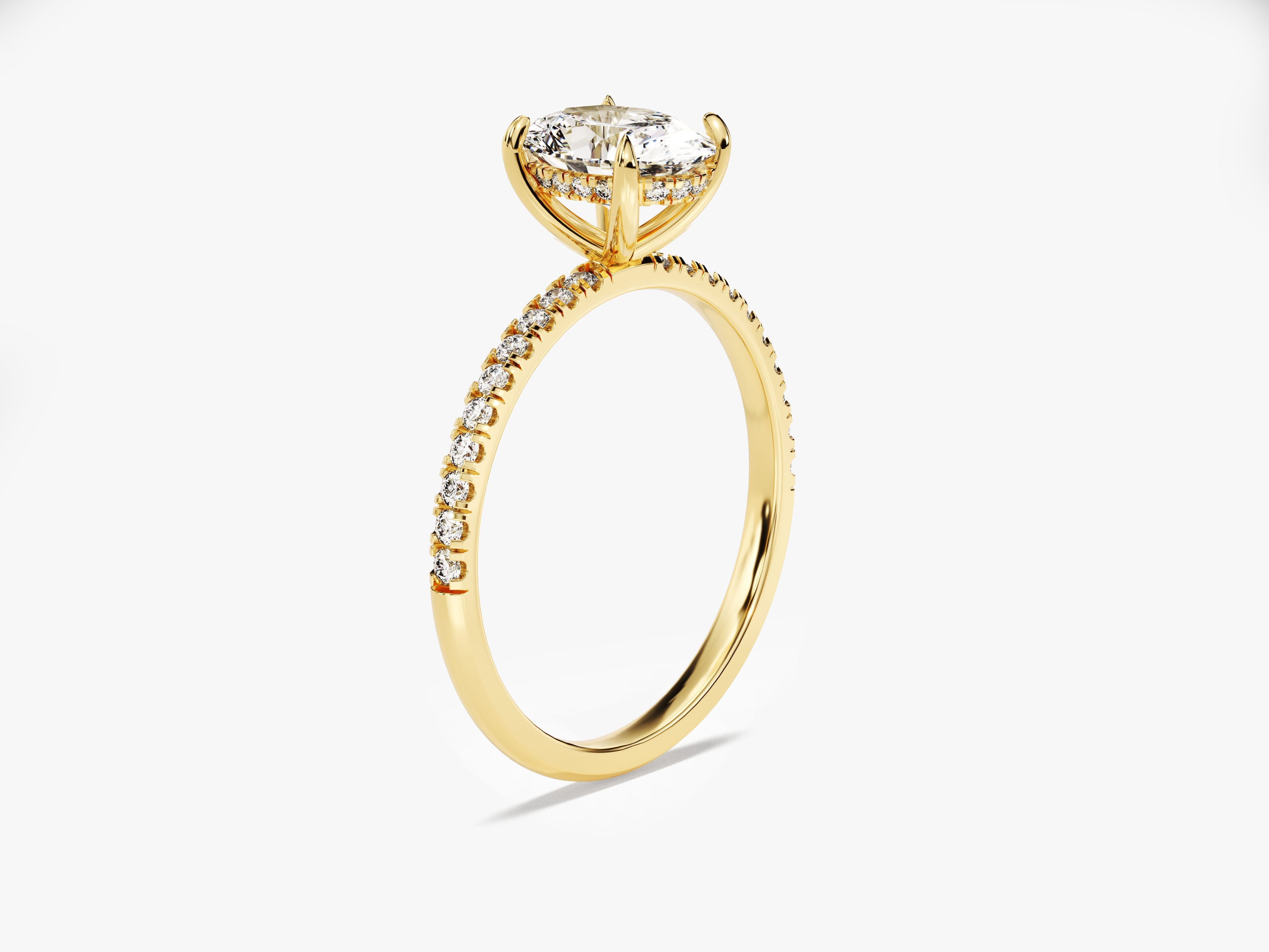 Gold diamond engagement ring with pavé band