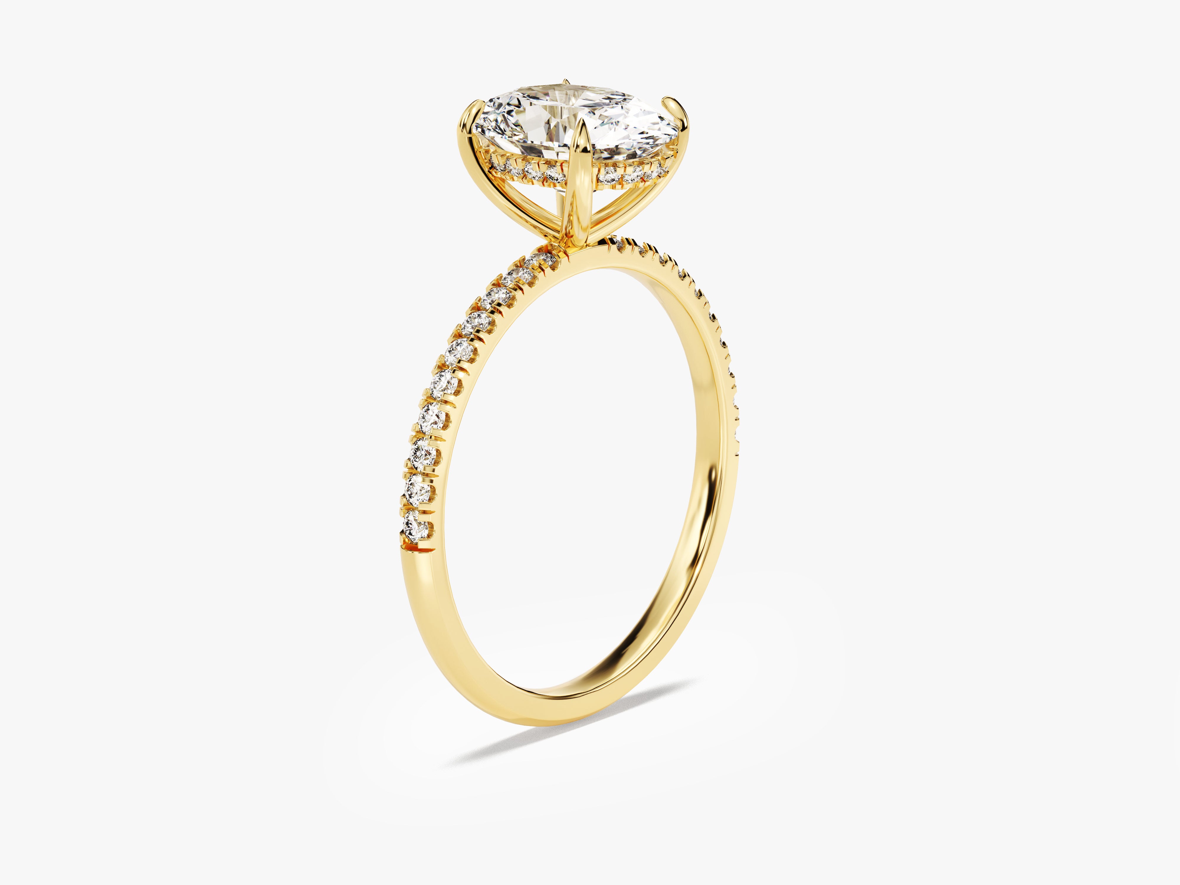 Gold diamond engagement ring with pave band