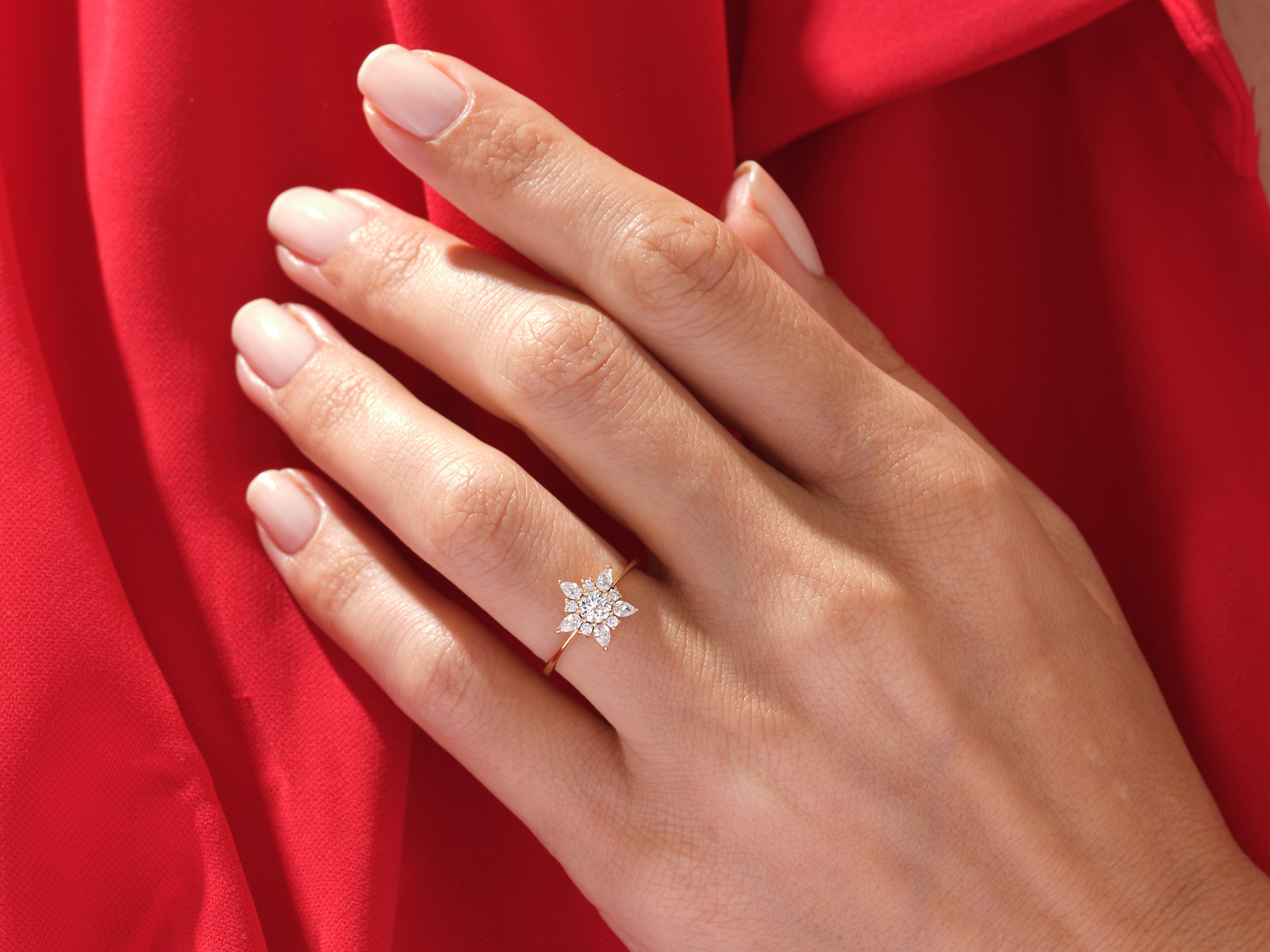 Diamond flower ring on hand, elegant jewelry for women