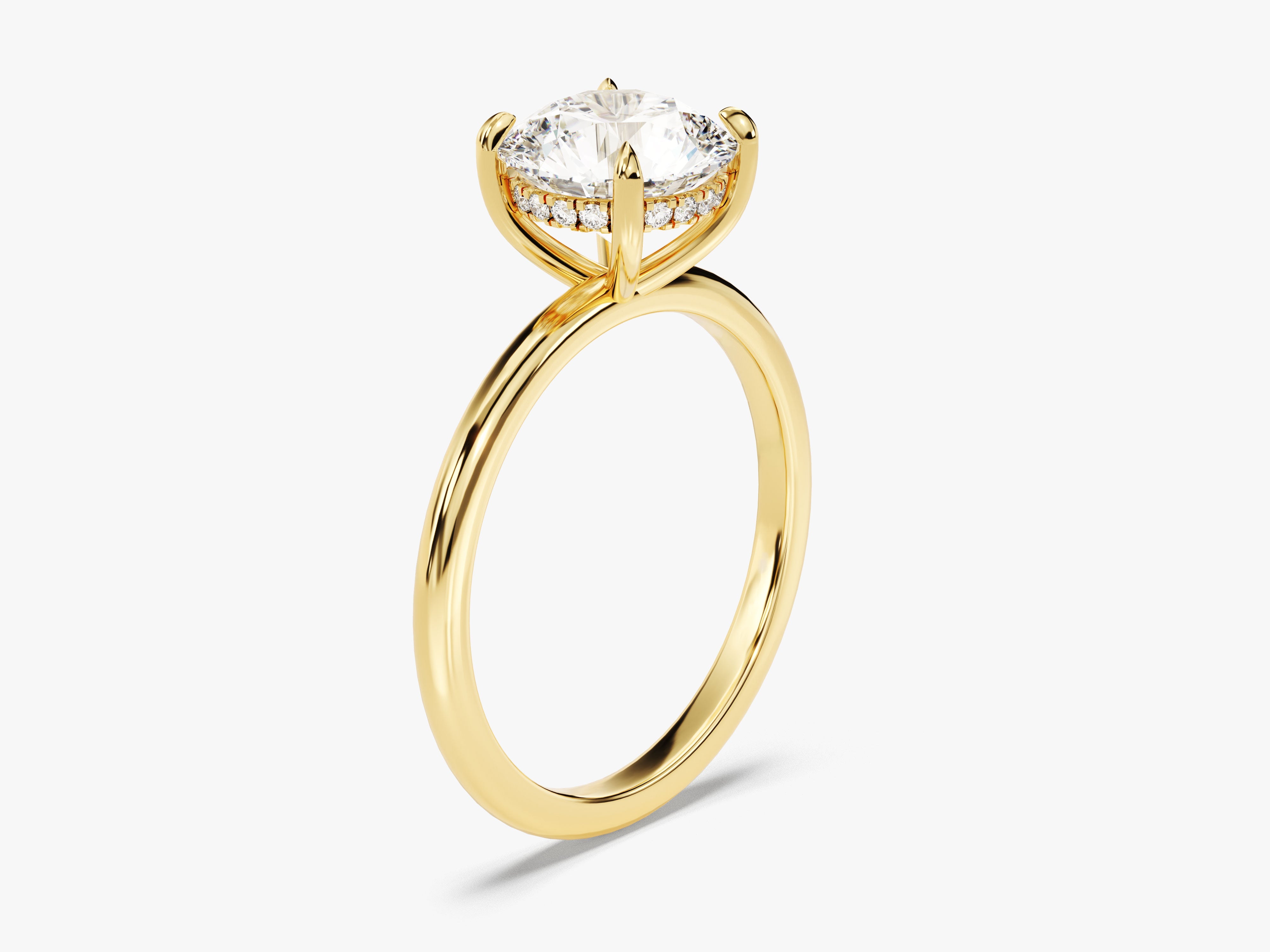 Gold diamond engagement ring with pave band