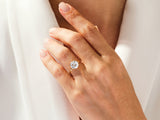 Diamond engagement ring on a woman's hand, fine jewelry