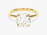 Gold ring with a large, brilliant-cut diamond engagement ring