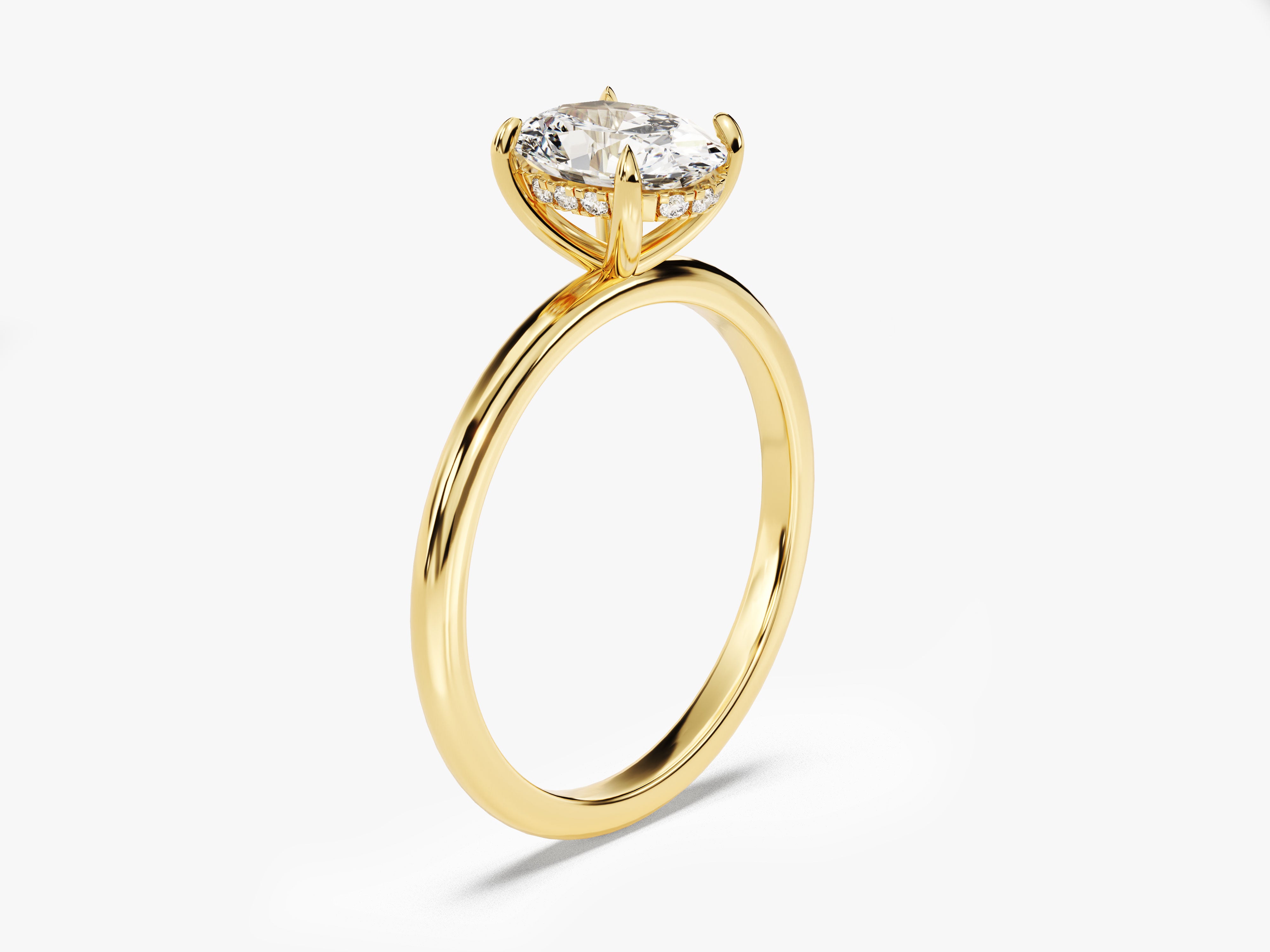 Gold diamond engagement ring with pave band