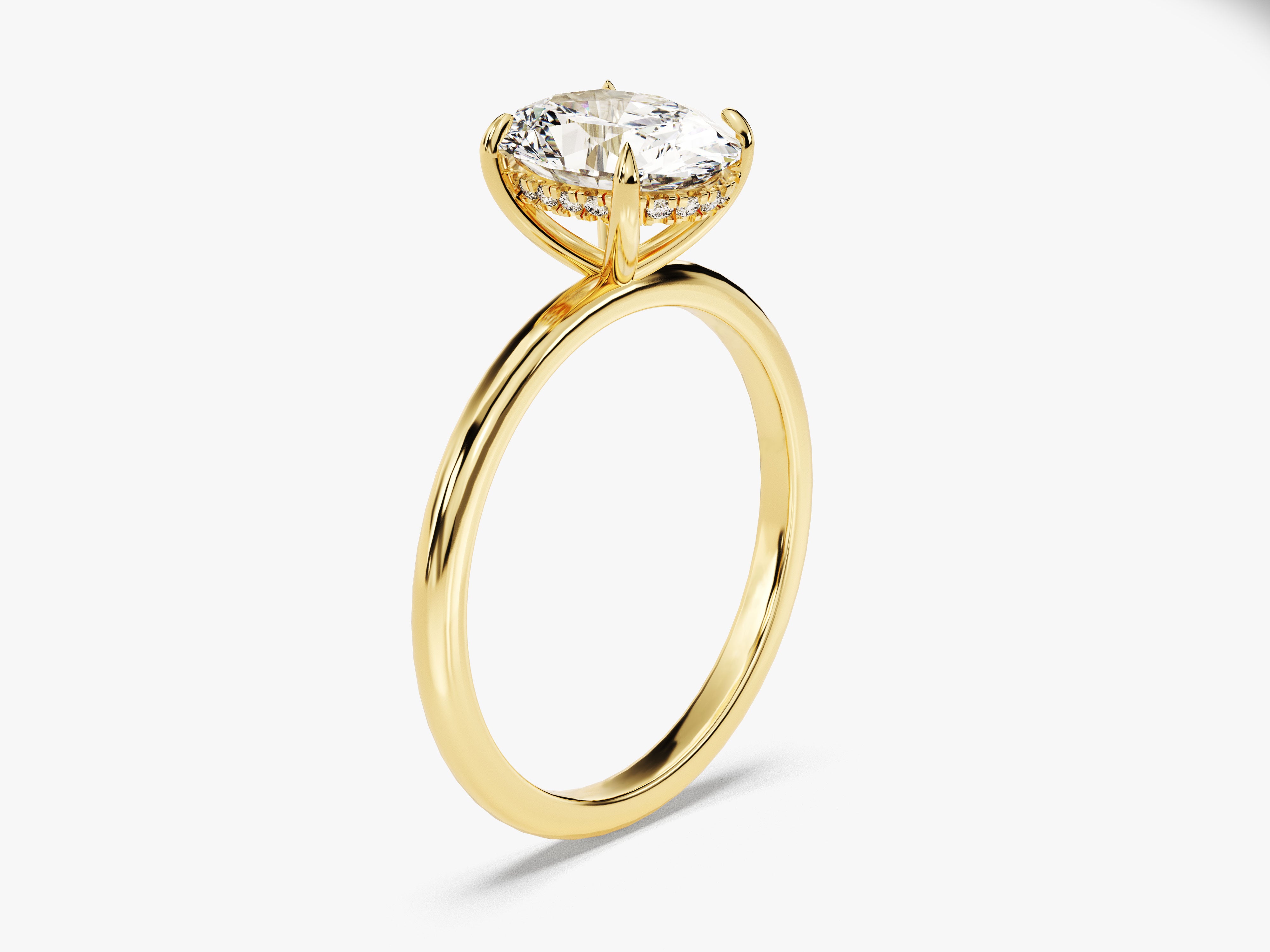 Gold diamond engagement ring with pavé band