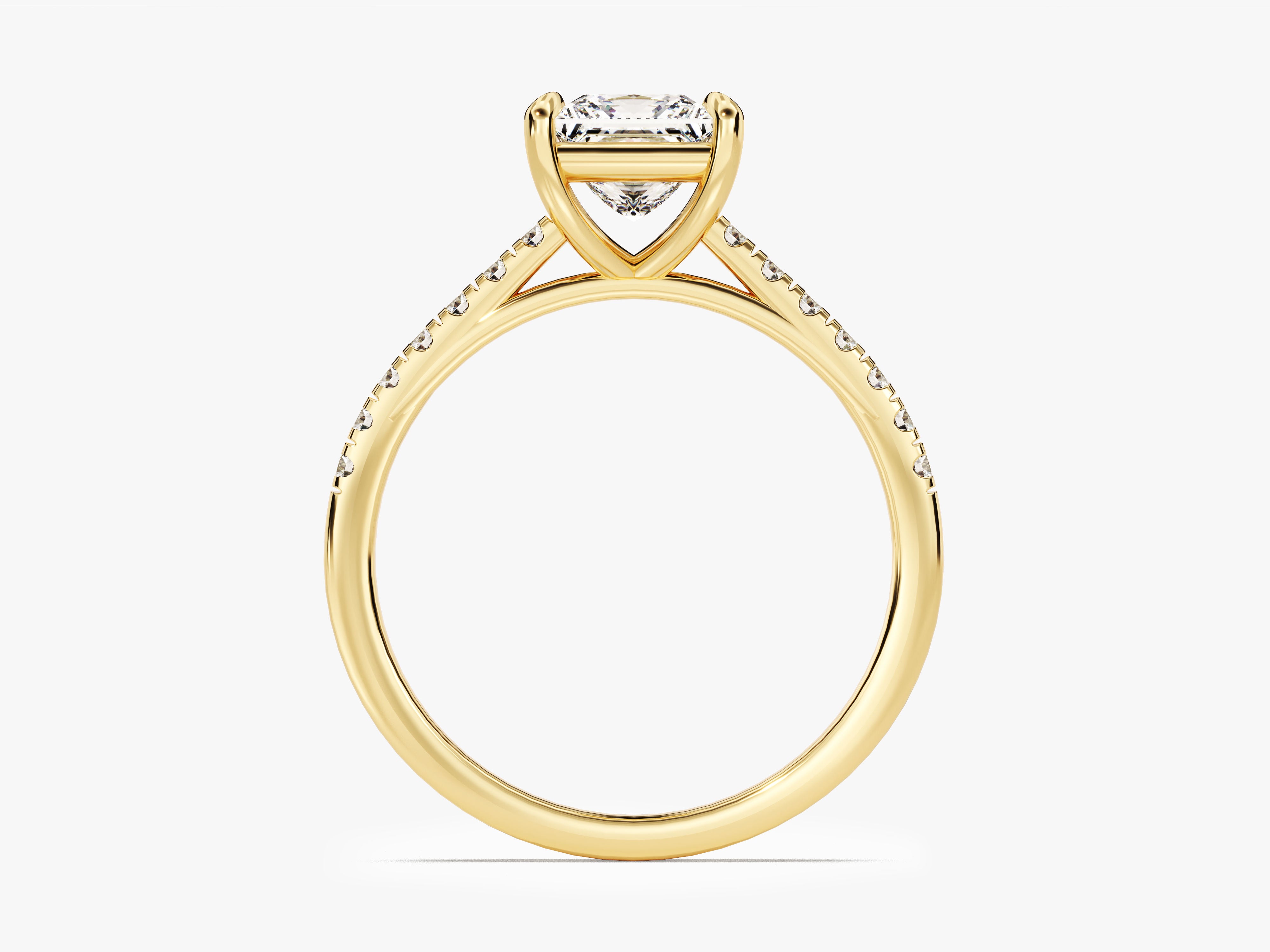 Gold diamond engagement ring with princess cut center stone