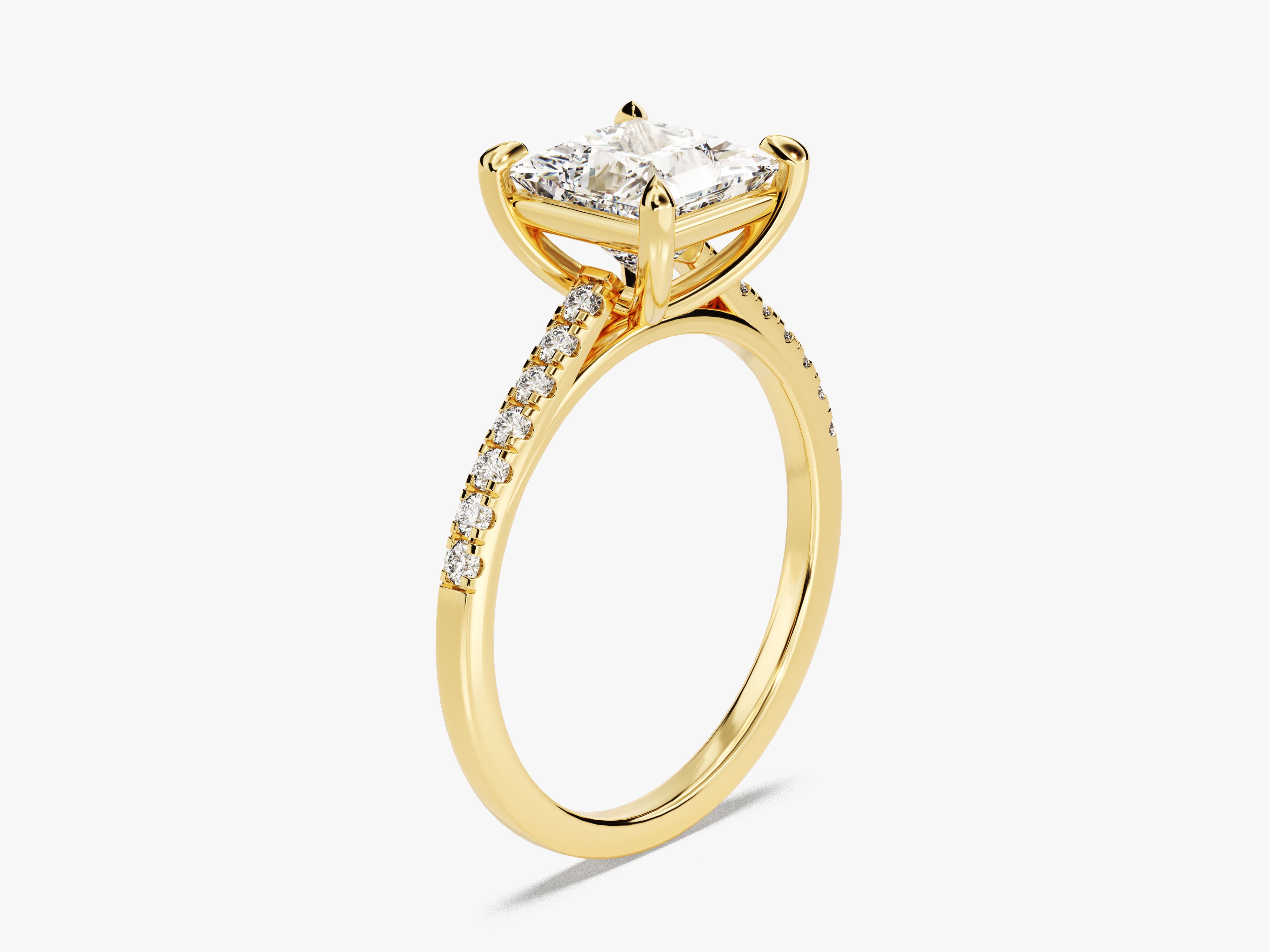 Gold princess cut diamond engagement ring with pave band