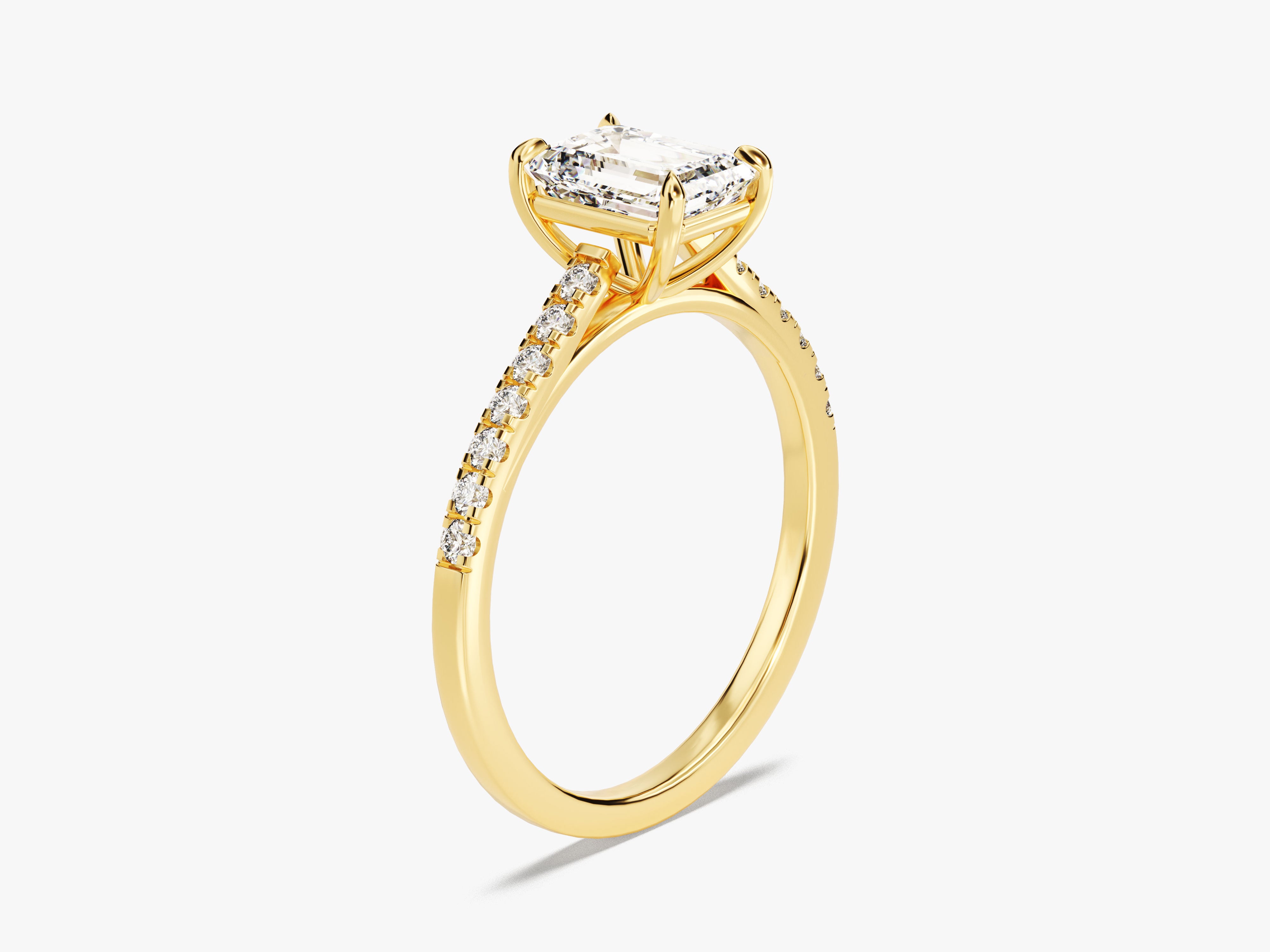Emerald cut diamond engagement ring in yellow gold