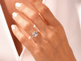 Emerald cut diamond ring on a hand, fine jewelry