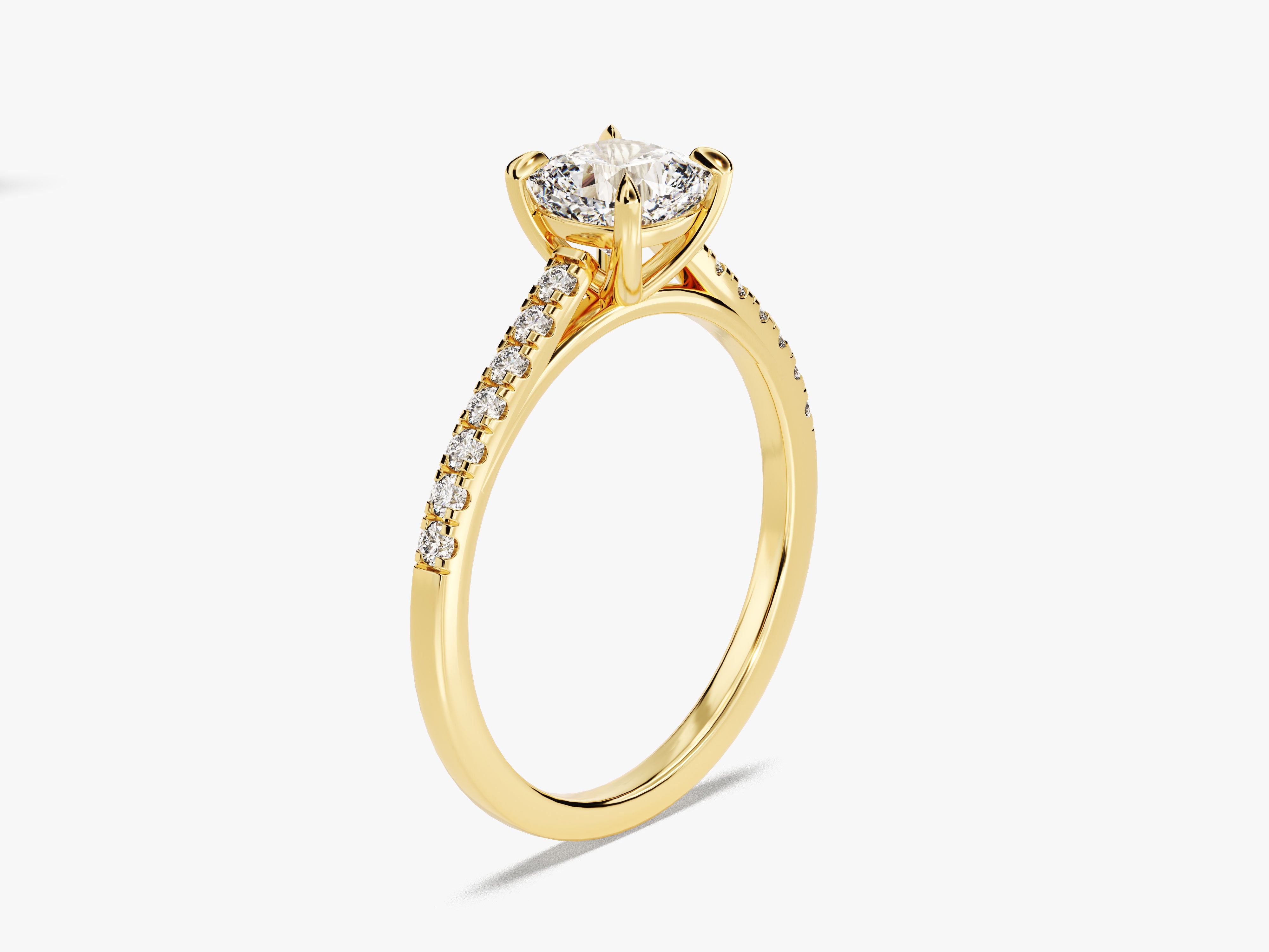 Gold diamond engagement ring with pavé band