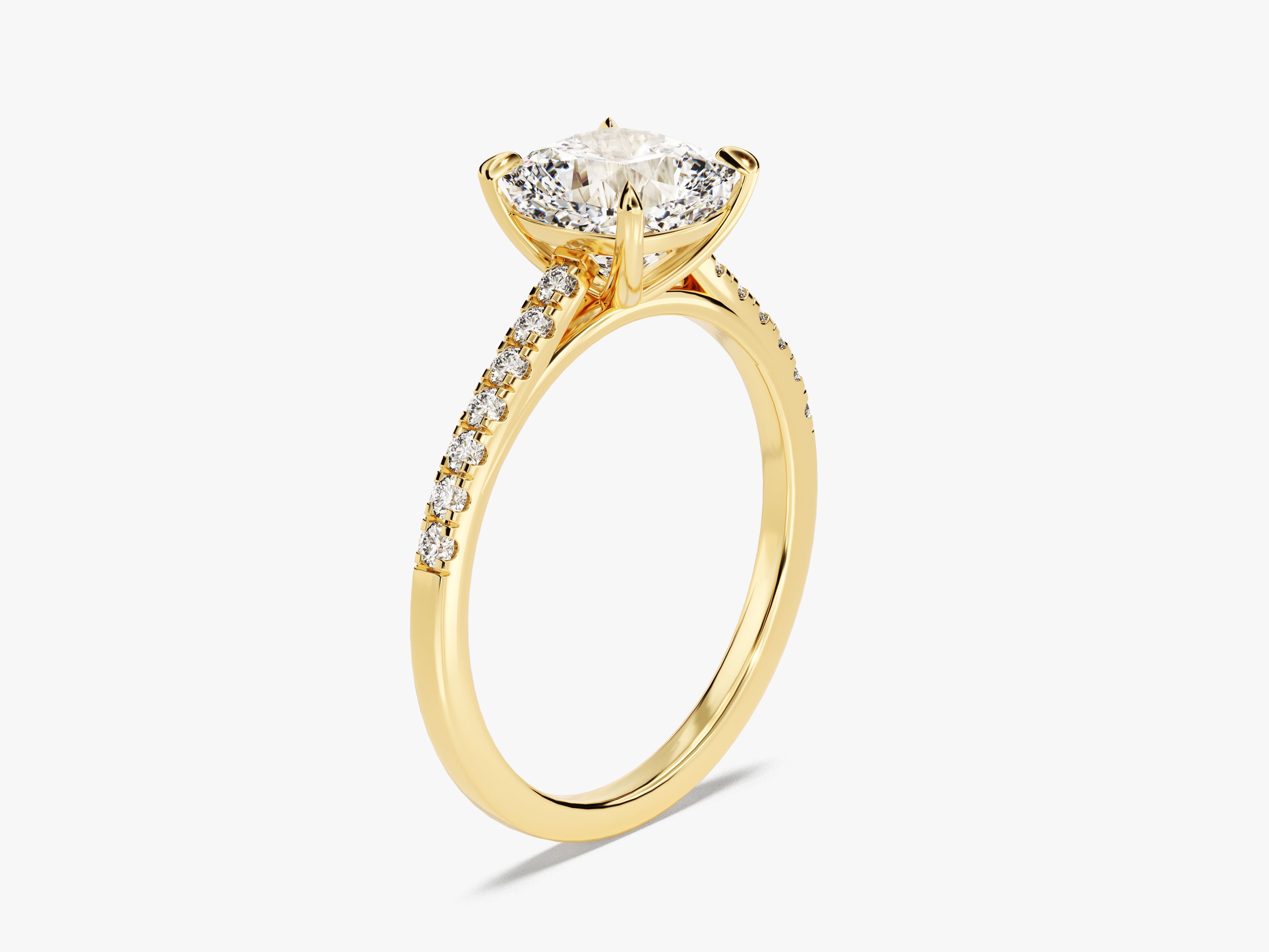 Gold diamond engagement ring with pavé band