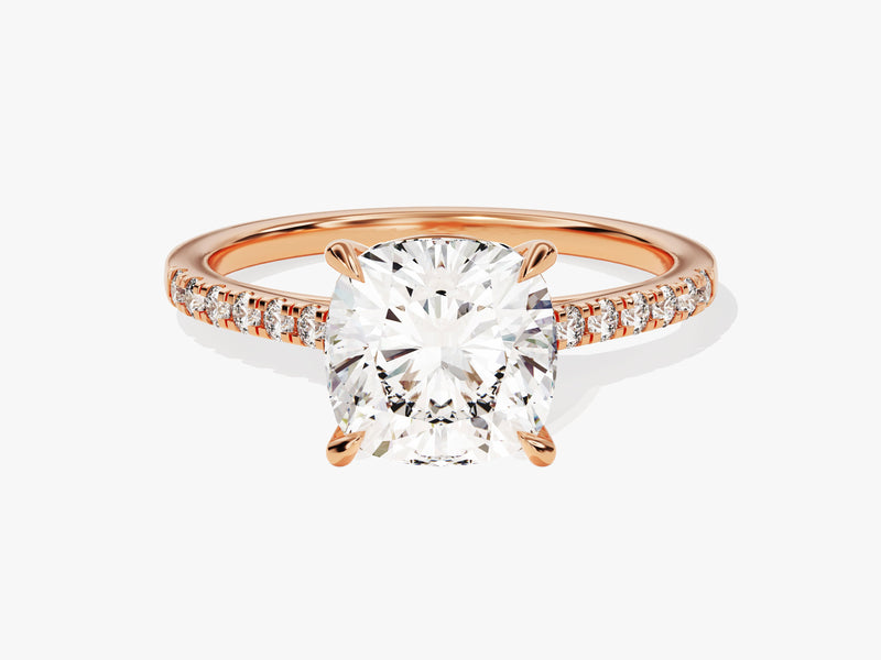 Rose gold diamond engagement ring with cushion cut center stone