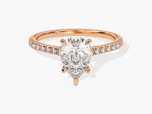 Rose gold pear-shaped diamond engagement ring with pave band
