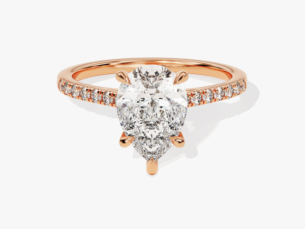 Rose gold pear cut diamond engagement ring with pavé band
