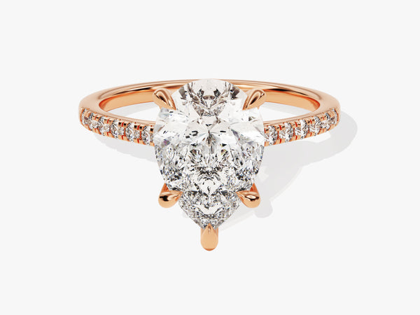 Rose gold pear cut diamond engagement ring with pave band