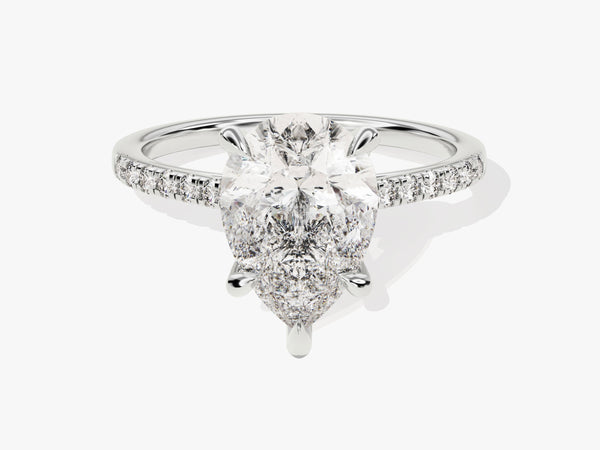 Pear cut diamond engagement ring with pavé band