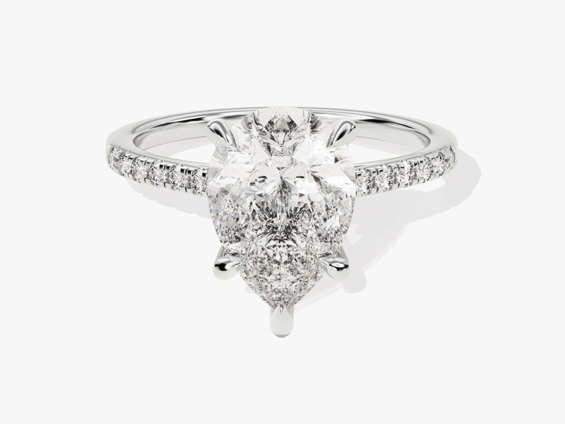 Pear cut diamond engagement ring with pavé band