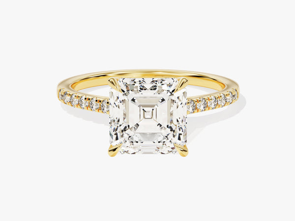 Emerald cut diamond ring with pave band in yellow gold