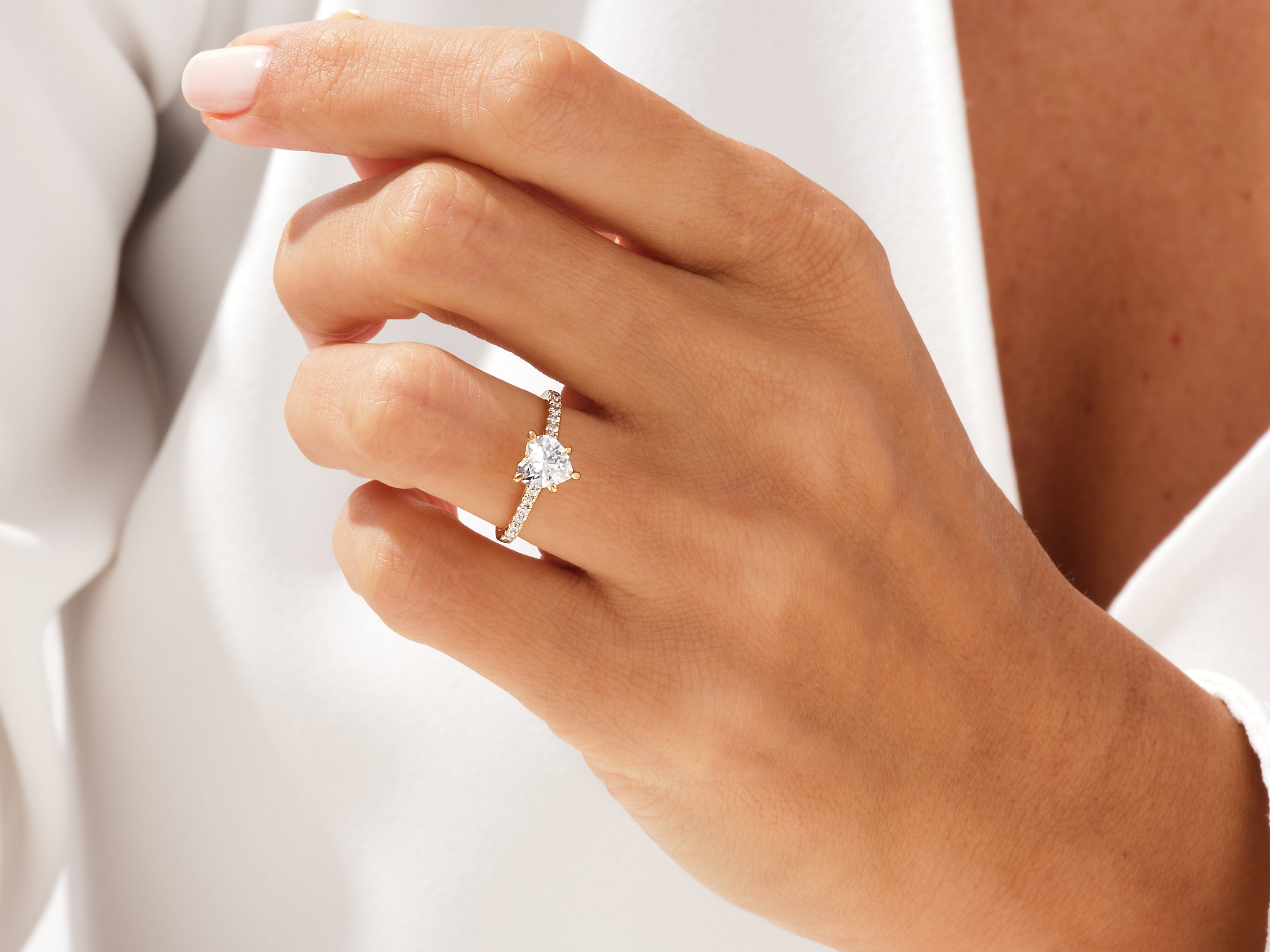 Heart diamond engagement ring on a woman's hand