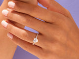 Heart-shaped diamond ring on a hand, jewelry for her