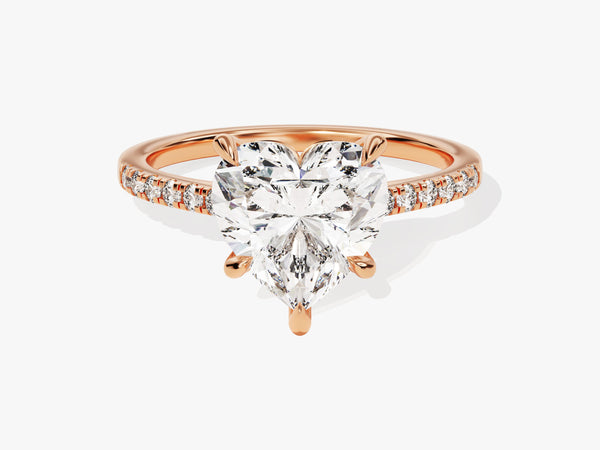 Heart-shaped diamond engagement ring in rose gold with pave diamonds