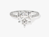 Heart-shaped diamond engagement ring with pave band