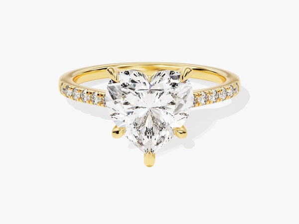 Gold ring with heart-shaped diamond and diamond band