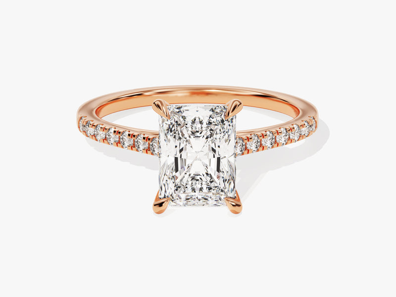 Rose gold engagement ring with radiant cut diamond and pave band