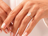 Marquise diamond engagement ring on a hand