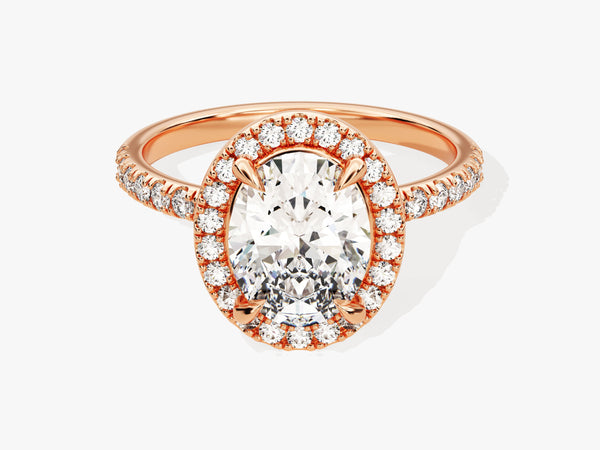 Oval diamond halo engagement ring in rose gold