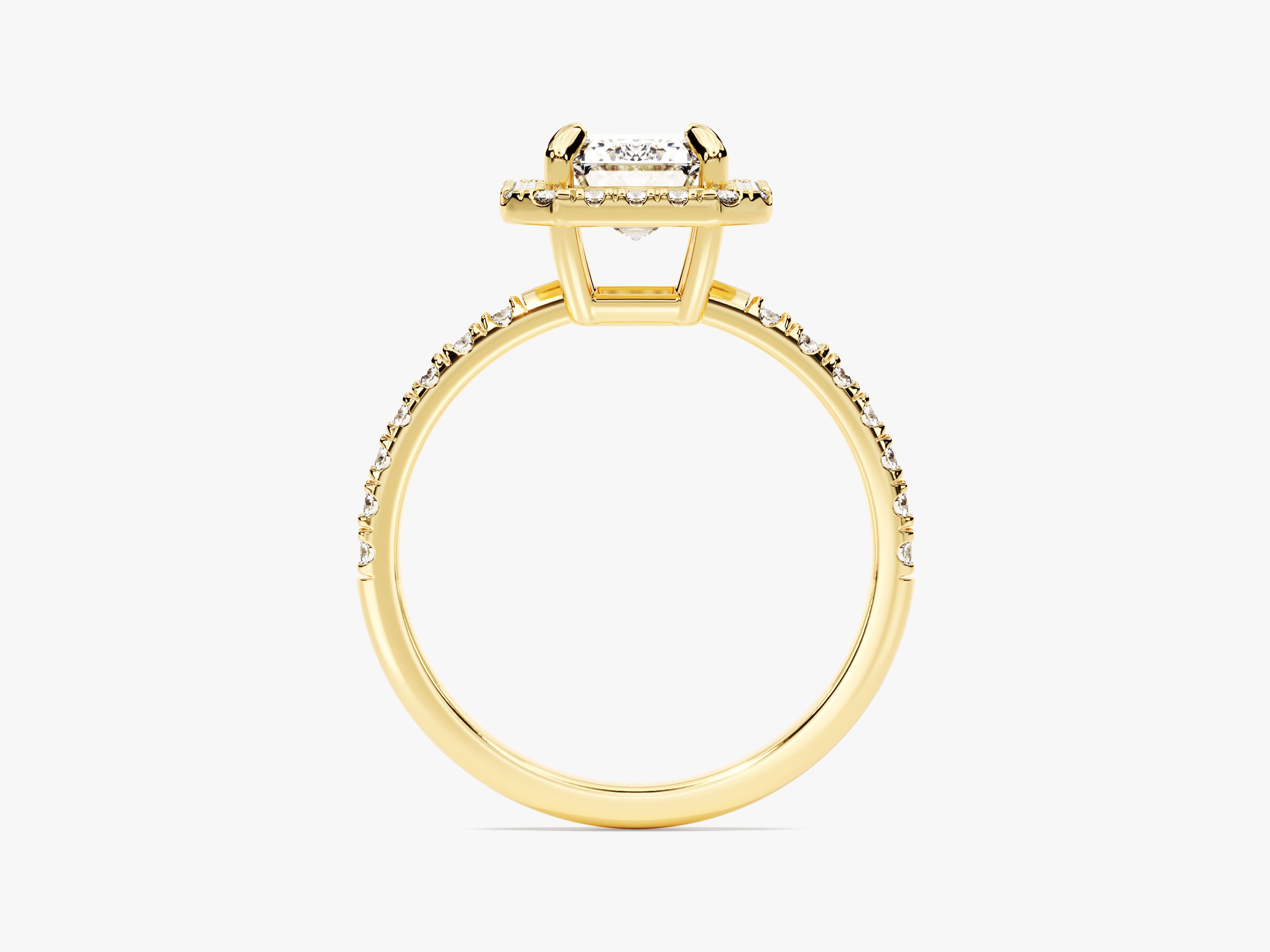 Gold diamond engagement ring with radiant cut center stone