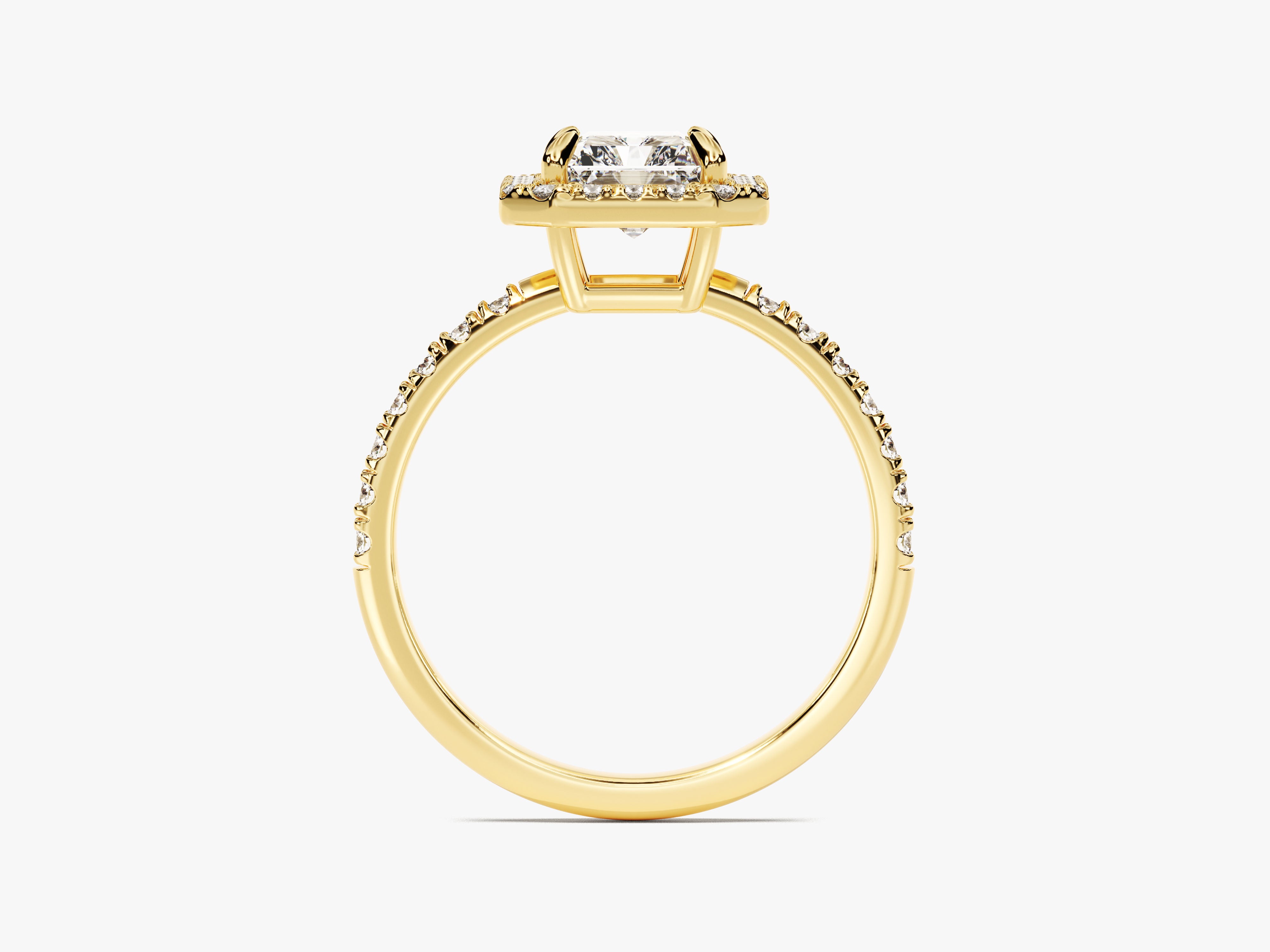 Gold diamond engagement ring with halo setting