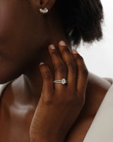 Oval Twisted Moissanite Engagement Ring with Pave Set Side Stones (1.50 CT)