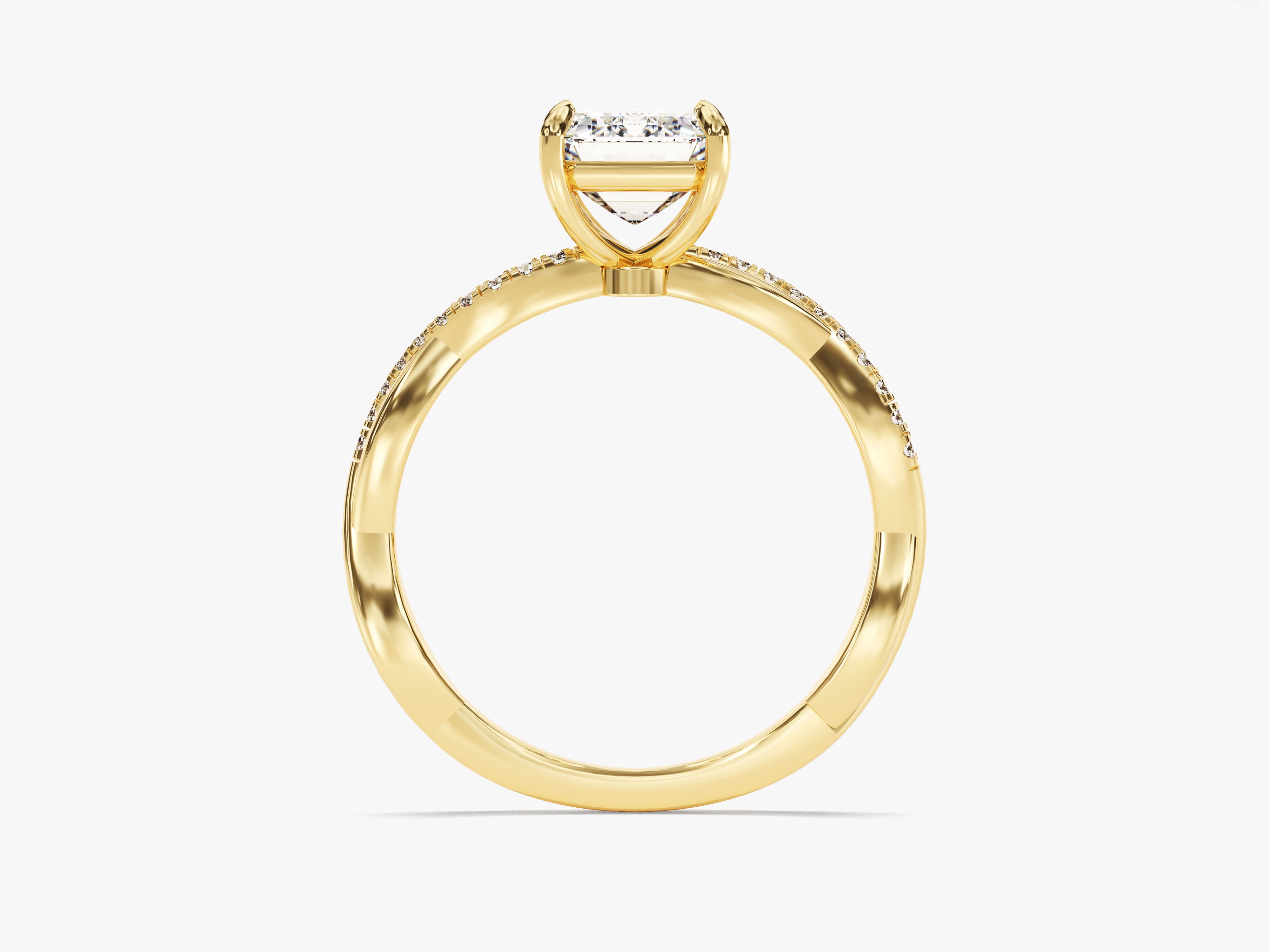 Gold engagement ring with emerald cut diamond and pave band