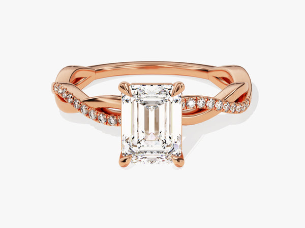 Emerald cut diamond ring with rose gold twisted band and accent diamonds