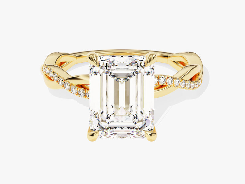 Emerald cut diamond ring with twisted gold band and pave diamonds