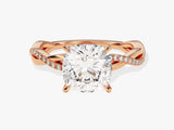 Rose gold diamond engagement ring with cushion cut center stone