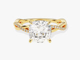 Gold diamond engagement ring with cushion cut center stone