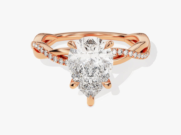 Rose gold pear diamond engagement ring with pave band