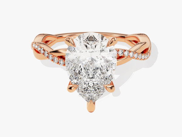 Rose gold pear diamond engagement ring with pave band
