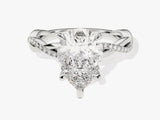 Pear-shaped diamond engagement ring with pave band
