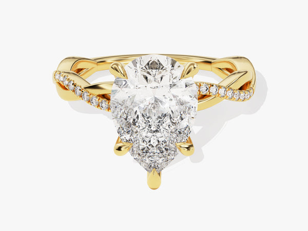 Gold pear cut diamond engagement ring with pavé band