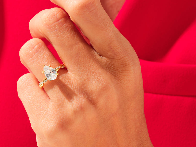 Pear Twisted Moissanite Engagement Ring with Pave Set Side Stones (3.00 CT)