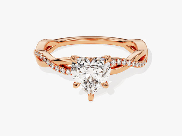 Rose gold twisted band ring with heart-shaped diamond engagement ring