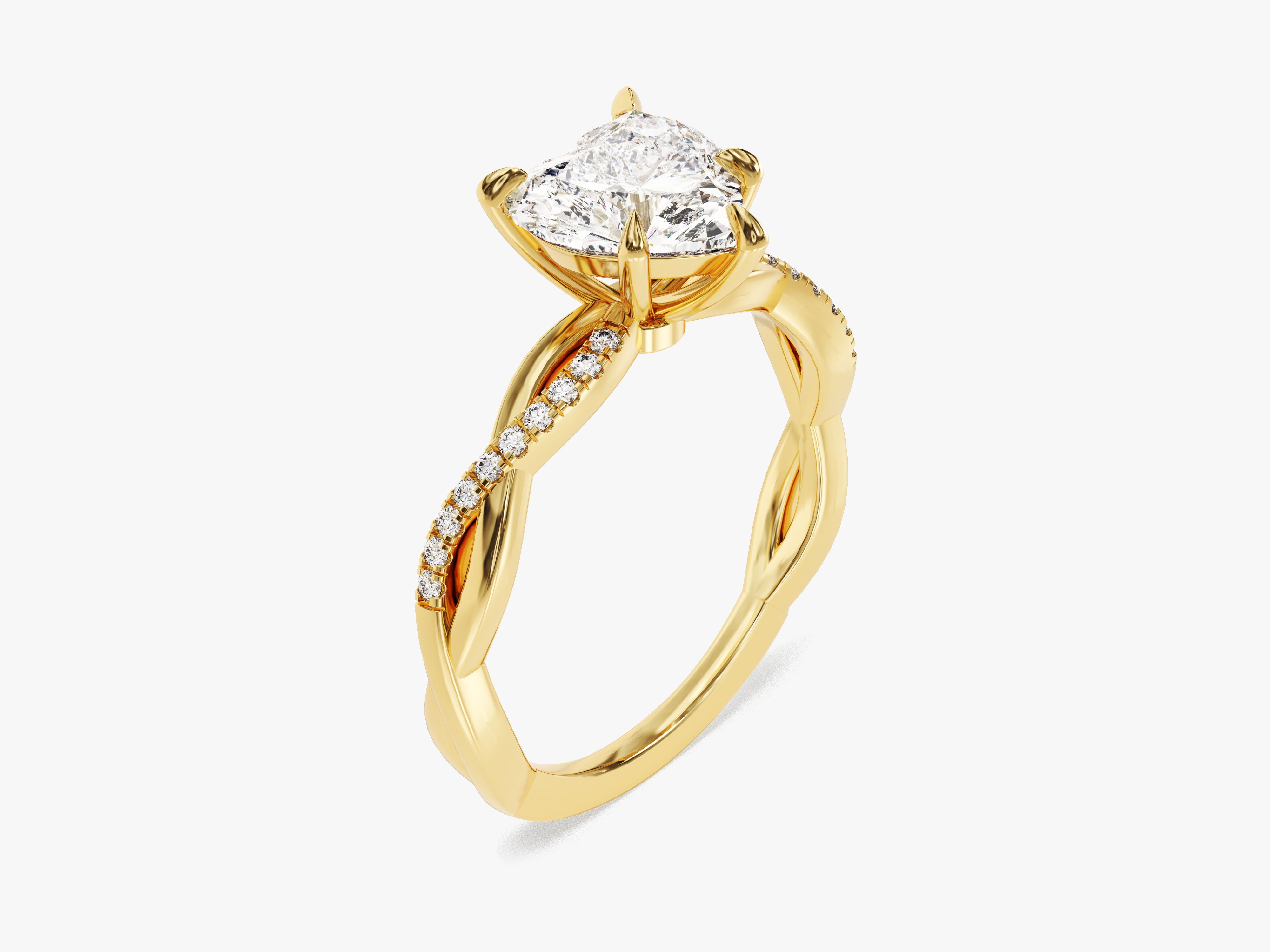Gold twisted band ring with diamond accents and a pear-shaped diamond