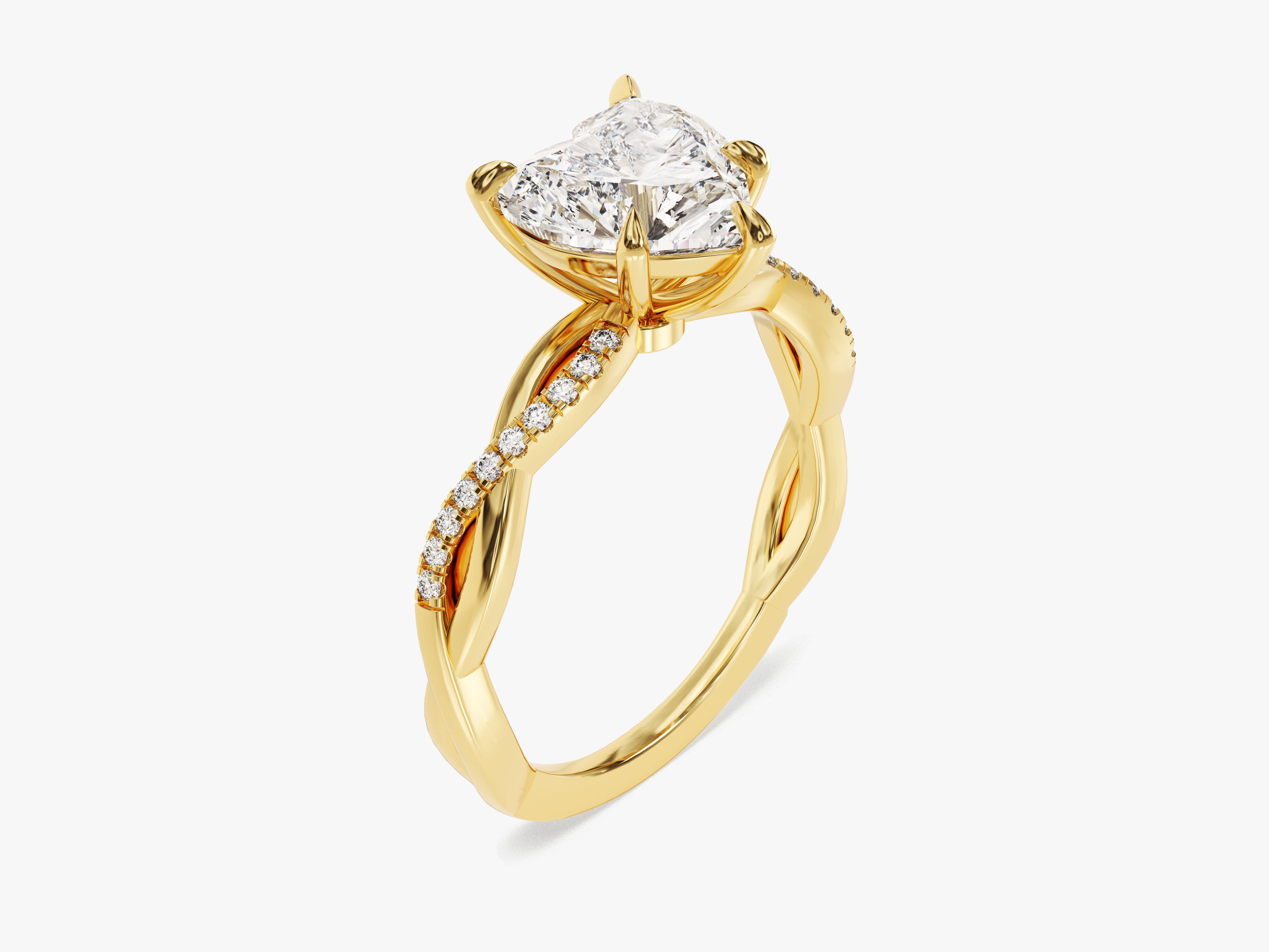 Gold twisted band ring with diamond accents and heart-shaped diamond