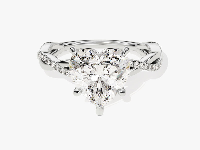 Heart-shaped diamond engagement ring with pave band