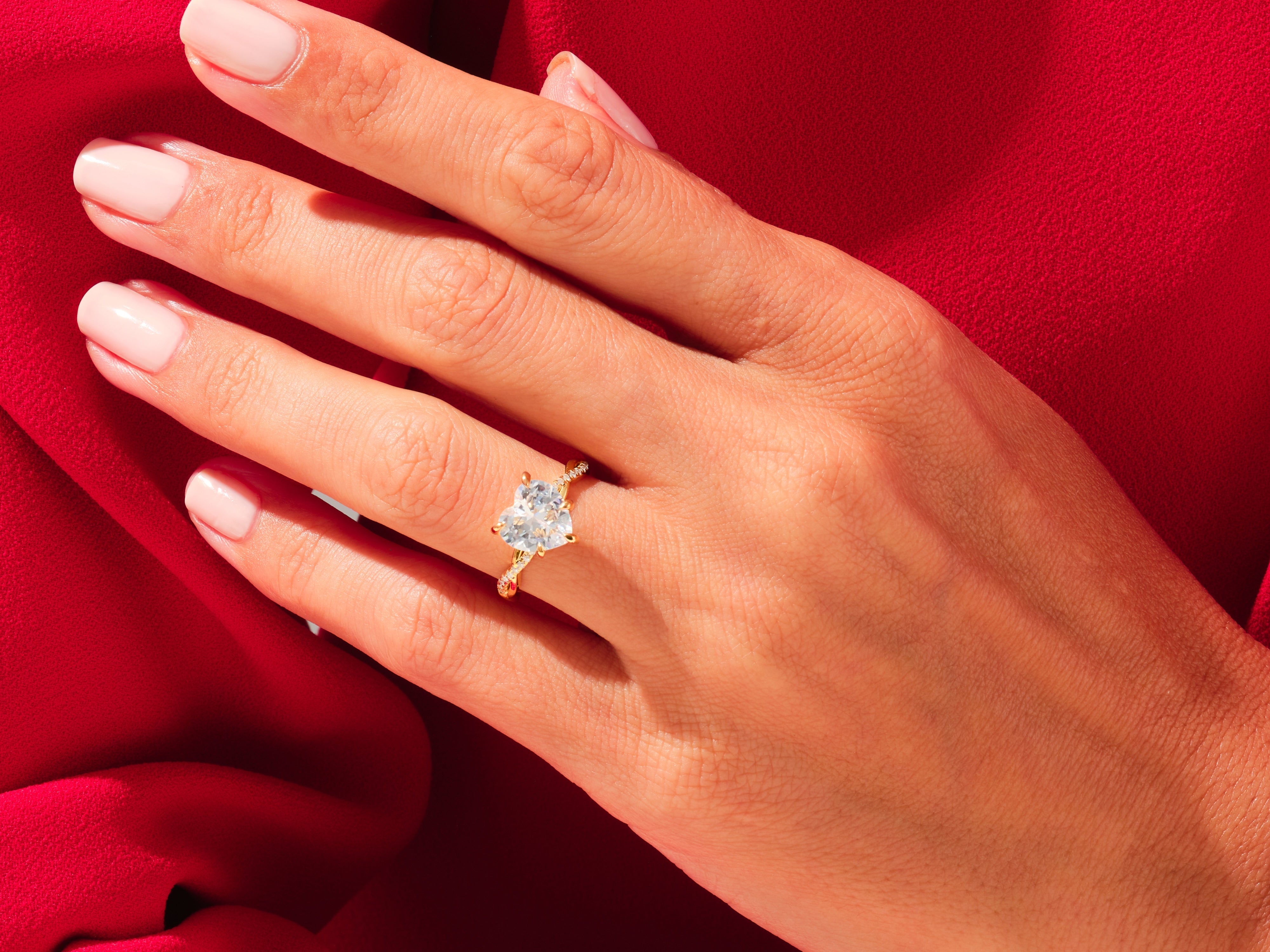 Diamond heart ring on hand, luxury jewelry for women