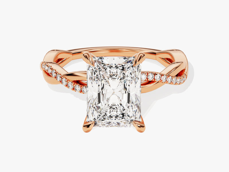 Rose gold twisted band ring with radiant cut diamond and pave diamonds