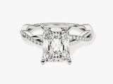 Radiant cut diamond engagement ring with twisted diamond band